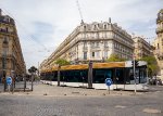 A Bombardier "Flexity" tram passes through Place Sadi-Carnot. 